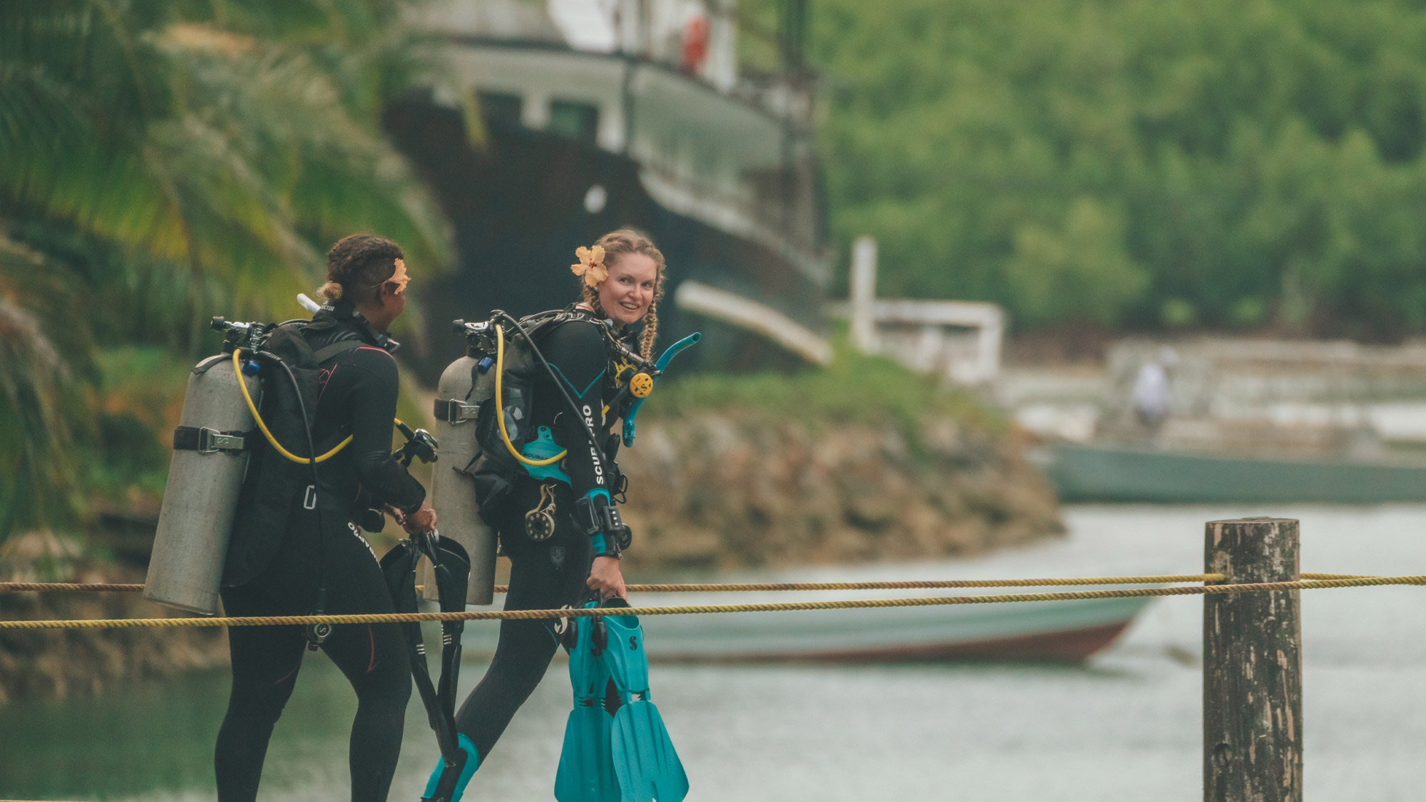 Two divers preparing for a dive