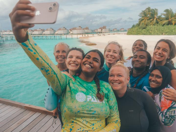A group of divers taking a selfie.