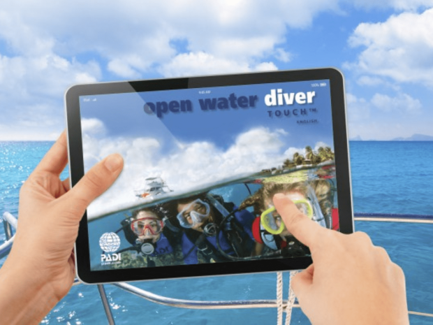 A tablet displaying an Open Water Diver lesson.