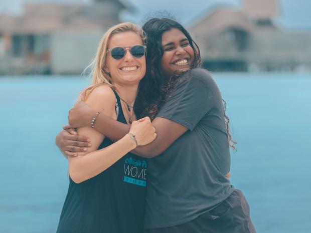 2 women celebrating PADI Women Dive Day
